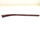 Front door trim bar