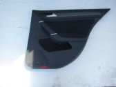 Moldura del tarjetero de la puerta trasera