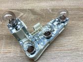 Tail light bulb cover holder