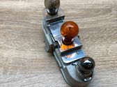 Tail light bulb cover holder