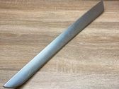 Front door trim bar