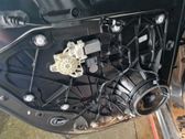 Mecanismo para subir la puerta trasera sin motor