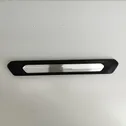 Front sill trim cover