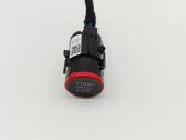 Bouton poussoir de démarrage du moteur
