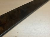 Front door trim bar