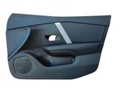 Front door card panel trim