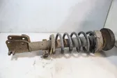 Front shock absorber with coil spring