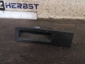 Bouton interrupteur de trappe à essence