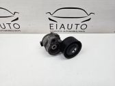Alternator belt tensioner