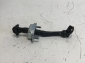 Front door check strap stopper