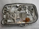 Tail light bulb cover holder