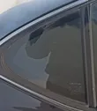 Ventanilla de ventilación de la puerta trasera