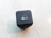 Botón interruptor de bloqueo de puertas