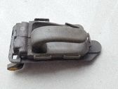 Manecilla interna puerta delantera