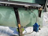 Regulador con motor de la ventanilla de la puerta corredera