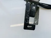 Bouton interrupteur de trappe à essence