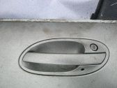 Manecilla externa puerta delantera