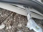 Rear door check strap stopper