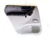 Moldura del tarjetero de la puerta trasera