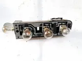 Tail light bulb cover holder