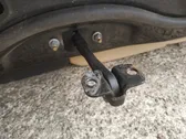 Front door check strap stopper