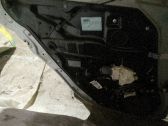 Regulador con motor de la ventanilla de la puerta corredera
