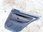 Moldura del tarjetero de la puerta trasera
