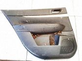 Moldura del tarjetero de la puerta trasera