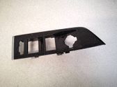 Front door window switch trim