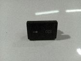 Botón interruptor de bloqueo de puertas