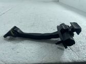 Rear door check strap stopper