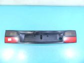 Trunk door license plate light bar