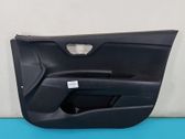 Front door card panel trim