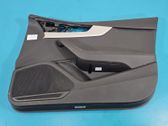 Front door card panel trim