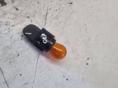 Tail light bulb cover holder