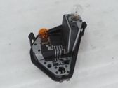 Tail light bulb cover holder