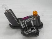 Tail light bulb cover holder