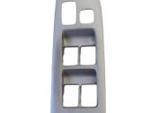 Front door window switch trim