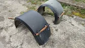 Rear arch fender liner splash guards