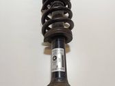 Front shock absorber with coil spring