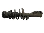 Front shock absorber with coil spring