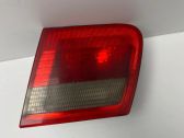Tail light bulb cover holder