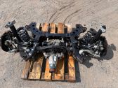 Rear axle beam with reductor