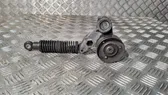 Alternator belt tensioner