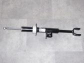 Front shock absorber with coil spring