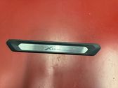 Front sill trim cover