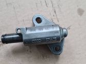 Timing belt/chain tensioner