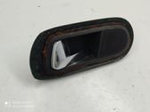 Rear door interior handle trim