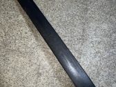 Moldura embellecedora de la barra del amortiguador trasero