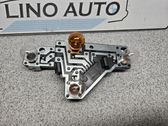 Tail light bulb cover holder